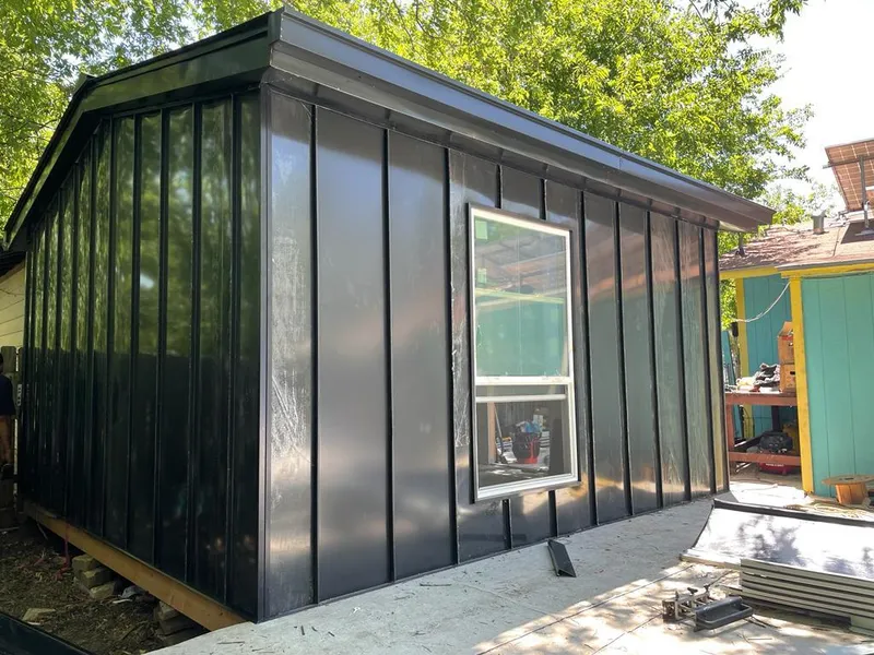 Black standing seam metal wall panels for Roof Inspection in Vadnais Heights