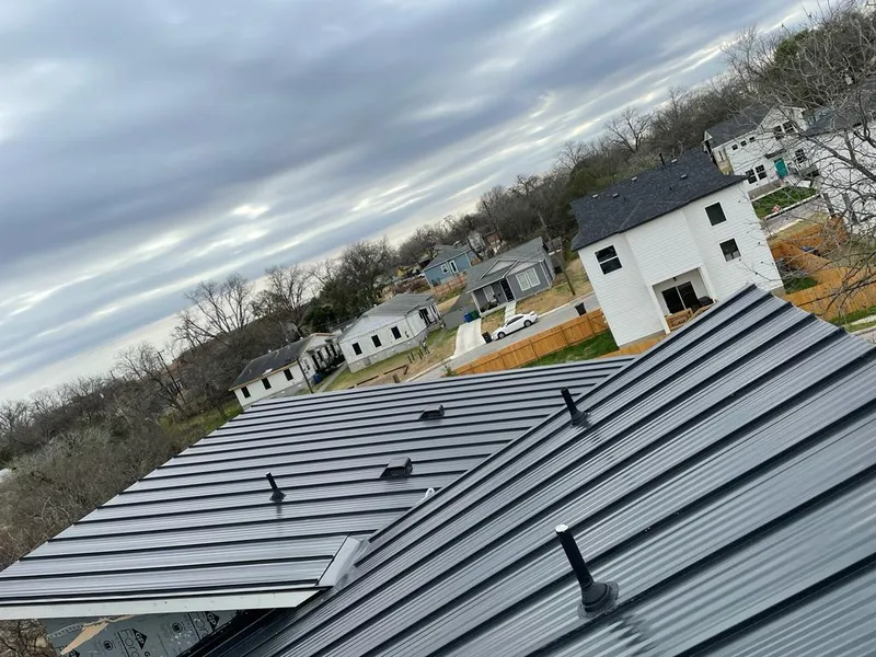 Standing seam metal roof panels with vents for Skylight Repair in Vadnais Heights